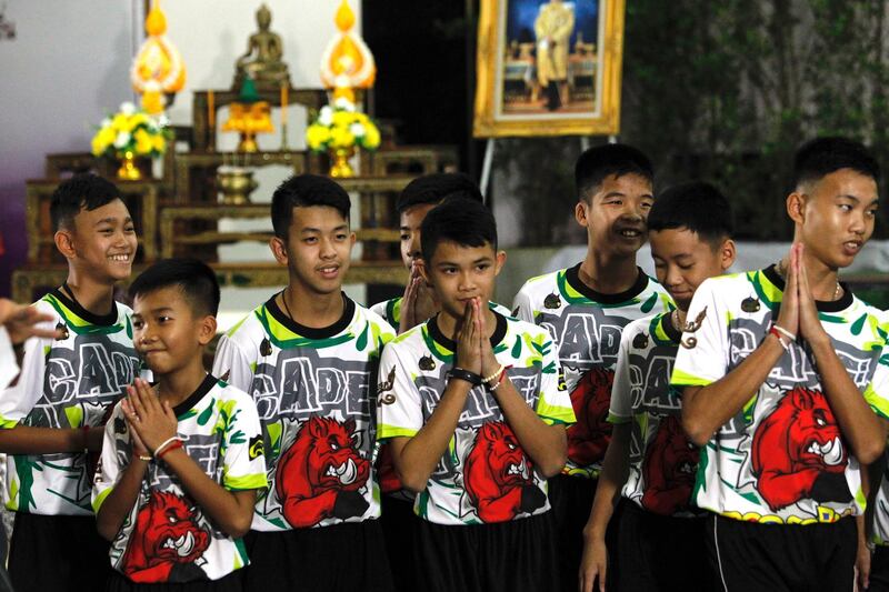 The 'Wild Boars' team apologised to their parents for not telling them that they were going for the cave. EPA