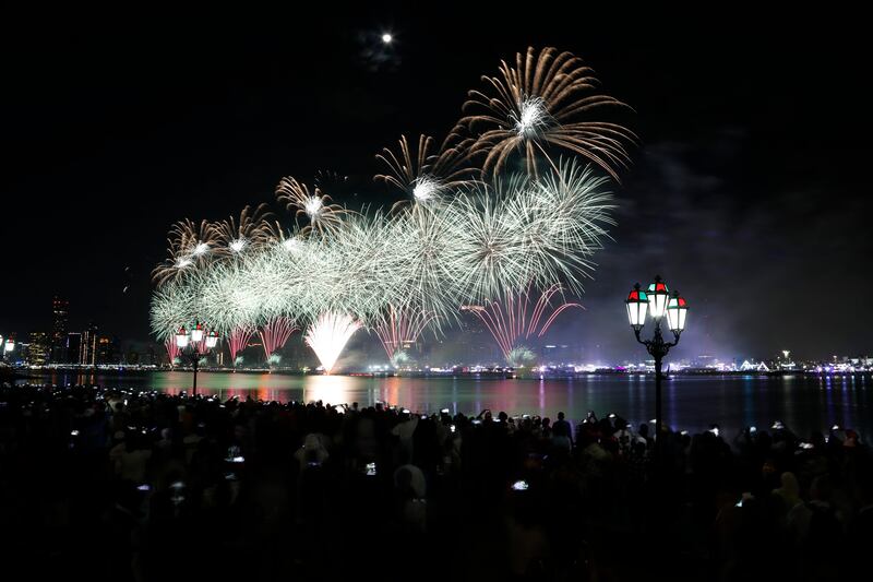 Fireworks over the Corniche in Abu Dhabi bring in 2024. Ruel Pableo for The National