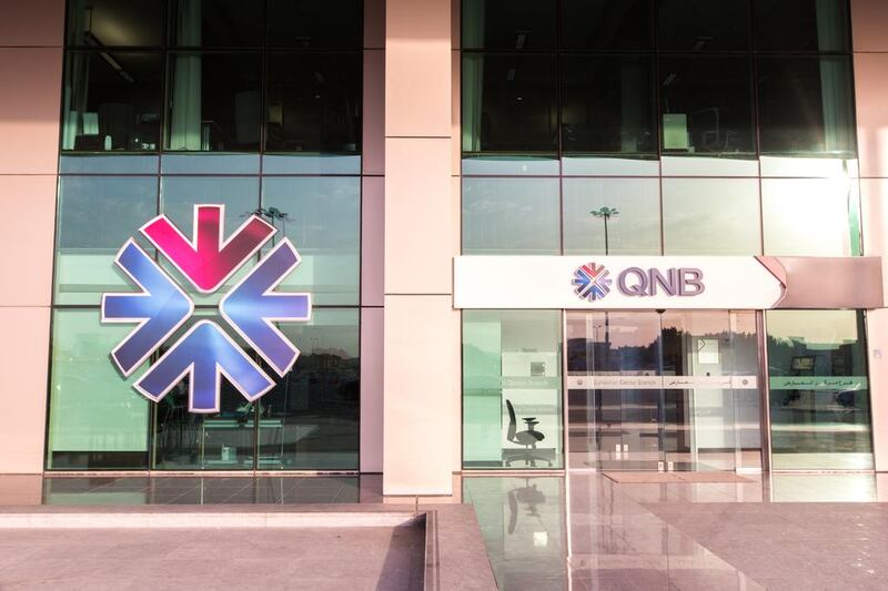 Qatar National Bank is considering seeking finance as pressure from neighbours starts to bite. Emre Rende / The National