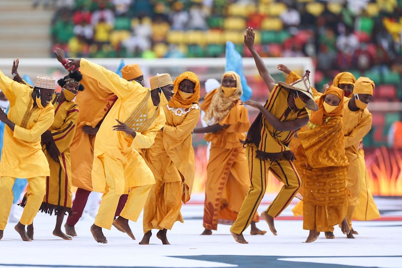 Dancers perform during the opening ceremony of the Africa Cup of Nations 2021 football tournament in Cameroon on January 9, 2022. AFP