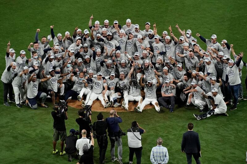 The Tampa Bay Rays celebrate after reaching the World Series for only the second time after a 4-2 game-seven win over the Houston Astros - on Saturday, October 17 - to seal the series 4-3. AP