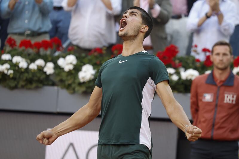 Carlos Alcaraz celebrates his victory over Alexander Zverev in the Madrid Open final. EPA