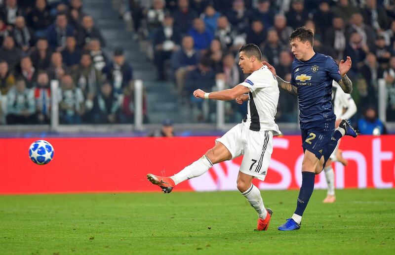 Juventus' Cristiano Ronaldo scores their first goal. Reuters