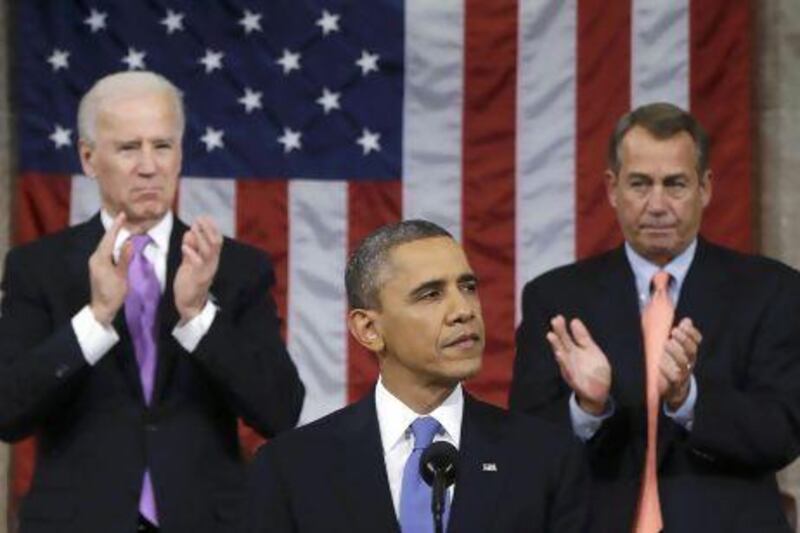 President Barack Obama delivers his State of the Union speech on Capitol Hill, flanked by vice president Joe Biden and US House speaker John Boehner.