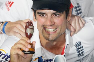 FILE - In this Sunday, Aug. 25, 2013 file photo England's captain Alastair Cook holds up the Ashes Urn during the presentation ceremony after the end of the fifth day of the fifth Ashes cricket Test against Australia at the Oval cricket ground in London. England batsman Alastair Cook will retire from international cricket after this week's test against India, it was announced on Monday, Sept. 3, 2018. The 33-year-old former captain has made a national record 12,254 runs in a 160-test career over 12 years. (AP Photo/Alastair Grant, File)