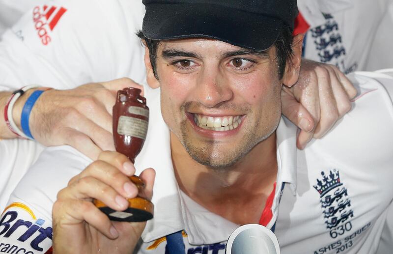 FILE - In this Sunday, Aug. 25, 2013 file photo England's captain Alastair Cook holds up the Ashes Urn during the presentation ceremony after the end of the fifth day of the fifth Ashes cricket Test against Australia at the Oval cricket ground in London. England batsman Alastair Cook will retire from international cricket after this week's test against India, it was announced on Monday, Sept. 3, 2018. The 33-year-old former captain has made a national record 12,254 runs in a 160-test career over 12 years. (AP Photo/Alastair Grant, File)