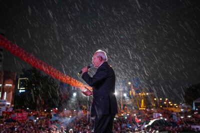 Republican People's Party leader and presidential candidate Kemal Kilicdaroglu campaigns during heavy rain in Ankara. AFP