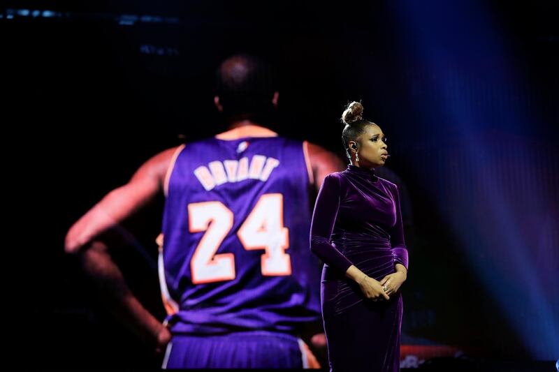 Jennifer Hudson sings a tribute to former NBA All-Star Kobe Bryant and his daughter Gianna, who were killed in a helicopter crash on January 26, before the NBA All-Star basketball game in Chicago.  AP