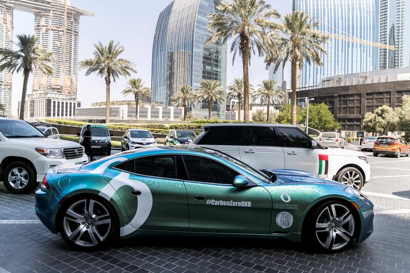 DUBAI, UNITED ARAB EMIRATES - SEP 24:

Hybrid and electric cars, parked outside Armani Hotel, where, today, a press aconference was held announcing incentives to promote electric vehicles in Dubai.

(Photo by Reem Mohammed/The National)

Reporter: LeAnne Graves
Section: NA