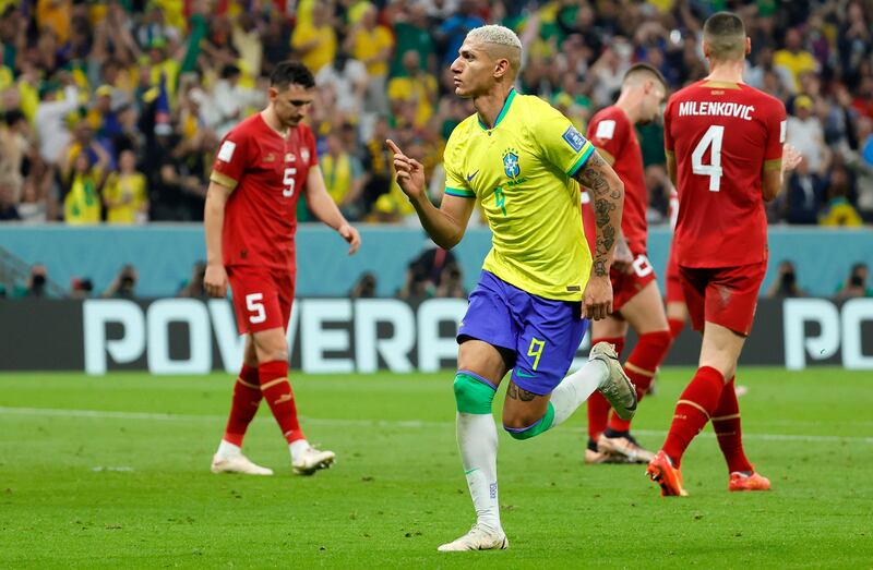 Richarlison celebrates after scoring his second goal. EPA