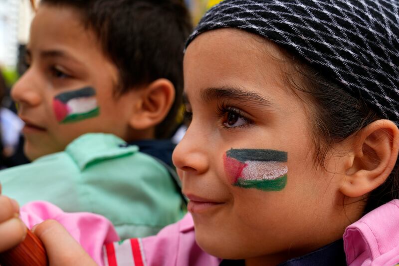 Children attend a rally in southern Beirut in solidarity with the Palestinian people in Gaza. AP