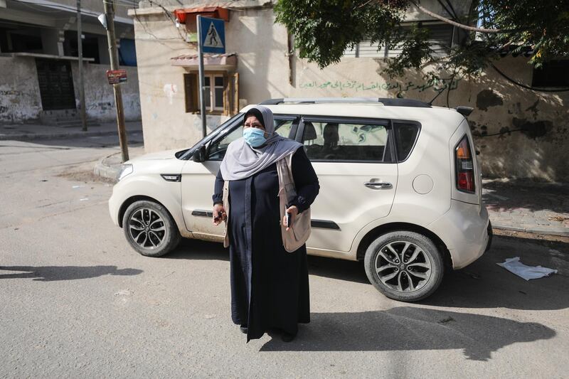 In the coastal Palestinian territory women have the same legal rights as men to drive a vehicle, but in practice the trade of taxi driver has been exclusively male, until now . Photo by Majd Mahmoud
