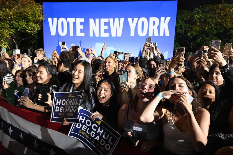 Supporters cheer during a rally for Democratic candidates at Sarah Lawrence College in Bronxville, New York. AFP