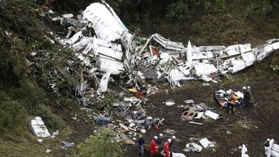 A LaMia jet carrying 77 people crashed into the Colombian mountainside minutes after the pilot reported running out of fuel. The crash killed 71 of 77 aboard. Fernando Vergara / AP Photo