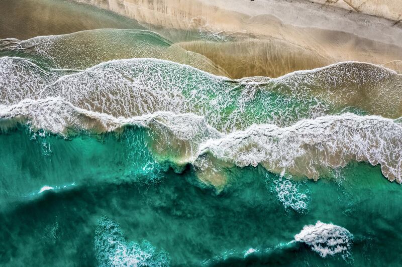 Waves against the shoreline in the UAE. Photo: Moadh Bukhash
