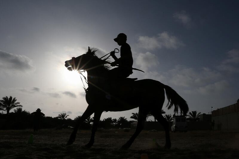 A young Palestinian rider takes part in a horseback archery training session in Zawayda, in the central Gaza Strip. Reuters