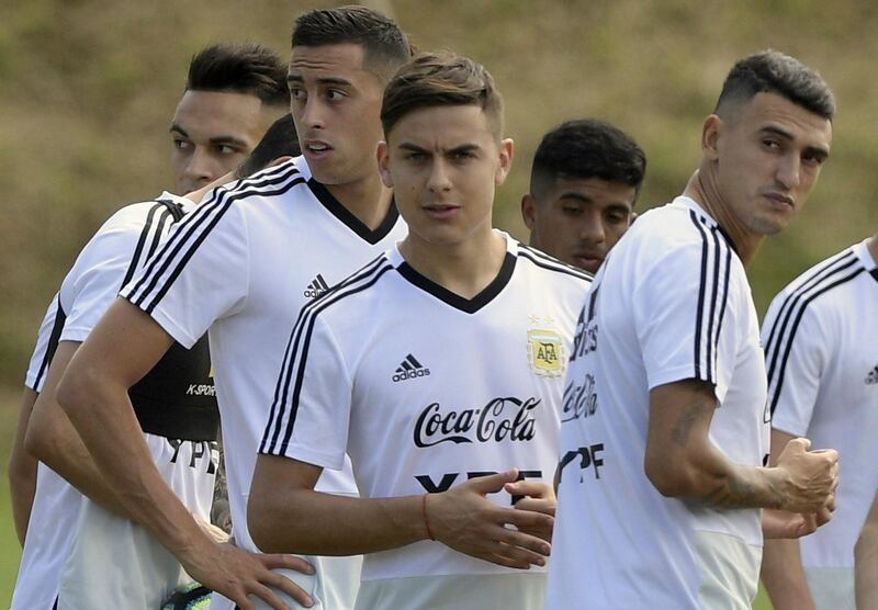 Argentina's footballers (L-R) forward Lautaro Martinez, defender Ramiro Funes Mori, forward Paulo Dybala and forward Matias Suarez take part in a training session in Salvador, Bahia, Brazil on June 16, 2019 ahead of the Copa America Group B football match against Paraguay to be held in Belo Horizonte on June 19. / AFP / JUAN MABROMATA
