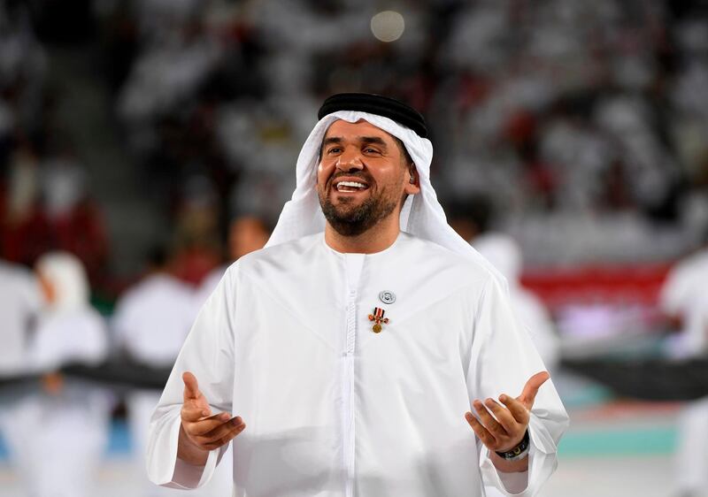Emirati singer Hussain Al Jassmi performs during the opening ceremony for the 2019 AFC Asian Cup football competition prior to the game between United Arab Emirates and Bahrain at the Zayed sports city stadiuam in Abu Dhabi on January 05, 2019. / AFP / Khaled DESOUKI
