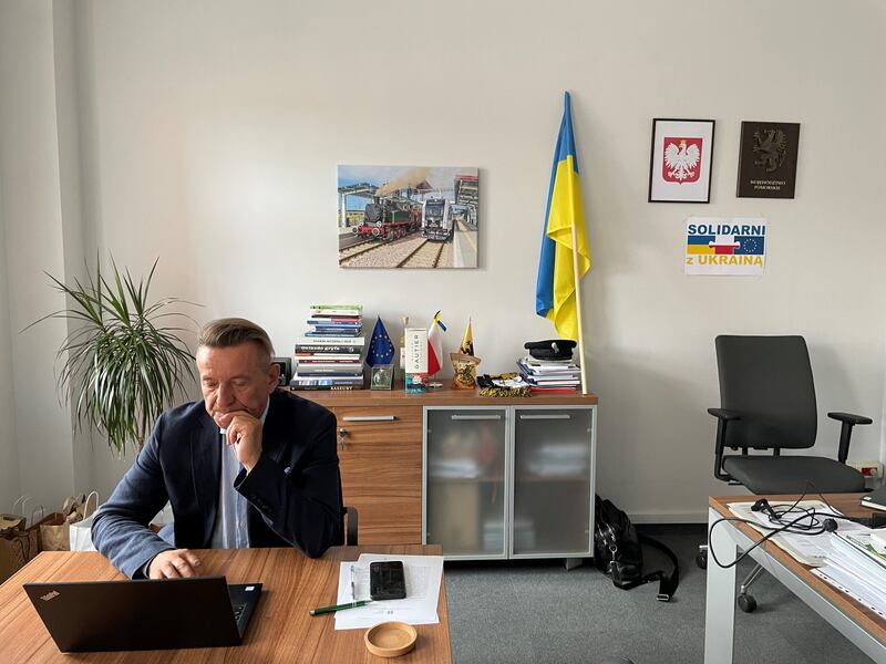 The Ukrainian flag and a message on solidarity forms the backdrop in the office of Leszek Bonna, marshal of Poland’s northern Pomerania region. Ramola Talwar Badam/ The National