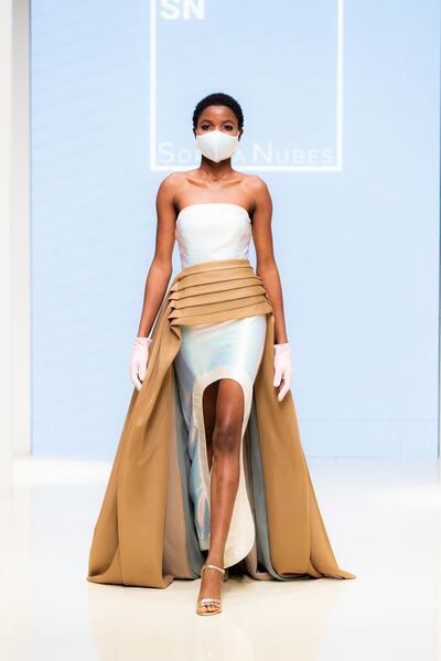 An intriguing mix of evening wear and PPE at Sophia Nubes at Arab Fashion Week. Courtesy AFW