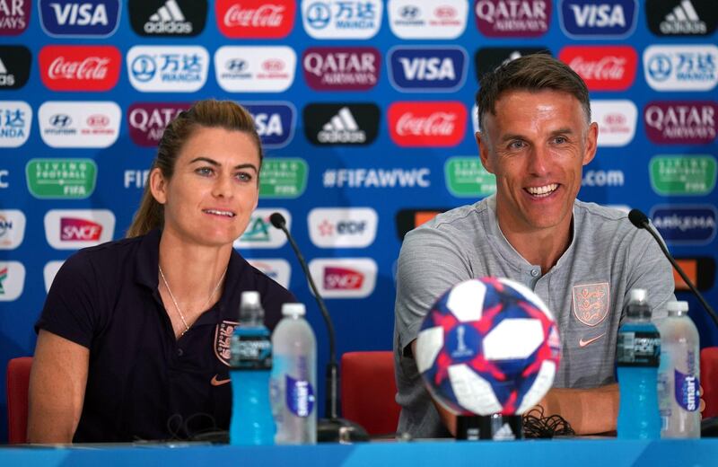 England's Karen Carney with manager Phil Neville in 2019. PA