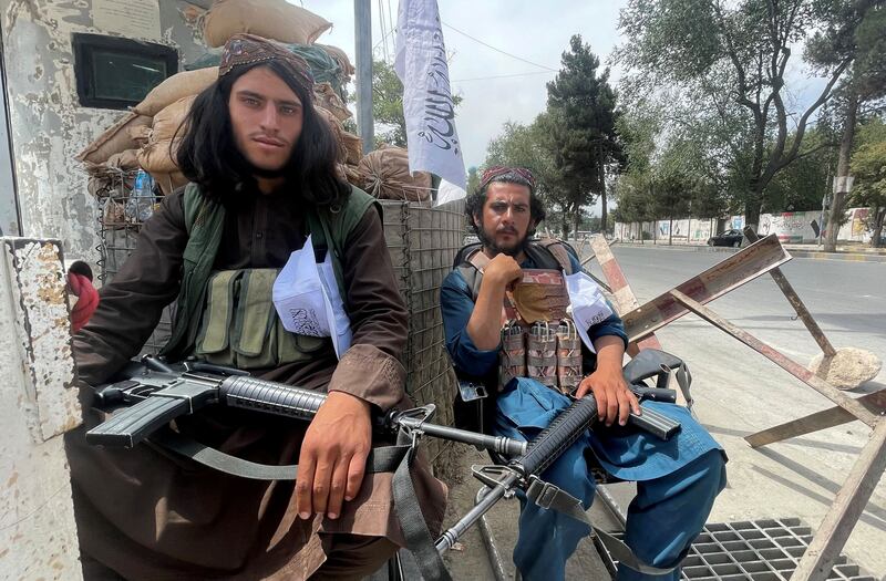 Members of the Taliban at a checkpoint in Kabul, Afghanistan, on Tuesday. Reuters