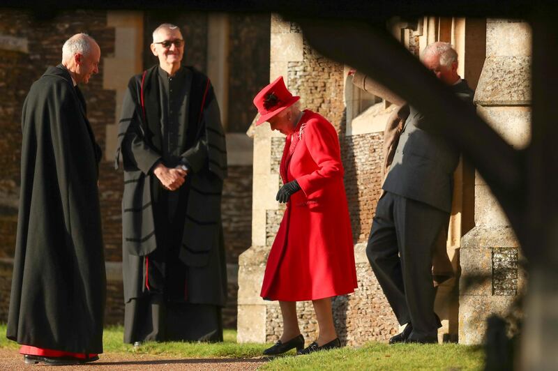 Britain's Queen Elizabeth II arrives to attend the Christmas day service at St Mary Magdalene Church in Sandringham. AP