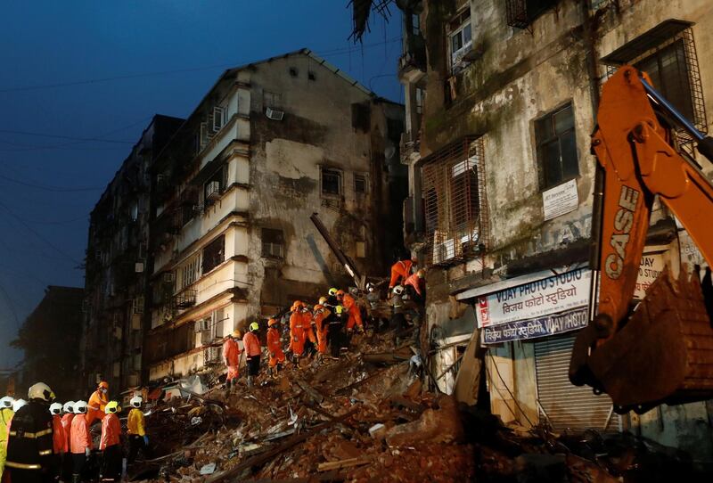 The building collapsed following days of heavy rain in Mumbai, India's financial capital. Reuters
