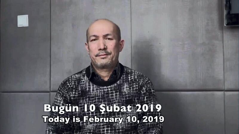 A screengrab from a Chinese state media video release purporting to show Uighur poet and musician Abdurehim Heyit in good health.