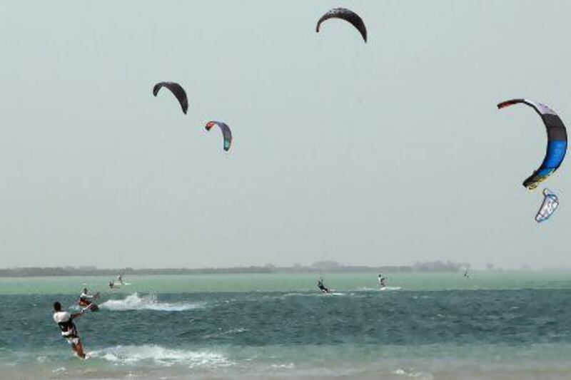 Kiteboarders enjoy themselves at Yas Island in Abu Dhabi. Ravindranath K / The National