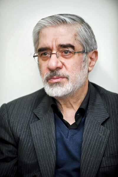 Iranian opposition leader Mir Hossein Mousavi is pictured at his sister's home as the family receives condolences for the death of his nephew Seyed Ali Habibi-Mousavi, on December 28, 2009 in Tehran. The 35-year-old nephew of Mir Hossein Mousavi was shot dead in Tehran during protests on December 27 which turned into the bloodiest showdown between opposition protesters and security forces in months. Iranian police said on December 29 that "terrorists" killed the nephew of opposition leader Mir Hossein Mousavi in an incident unrelated to anti-government riots at the weekend.
AFP PHOTO/ARASH ASHOURINIA (Photo by Arash Ashourinia / AFP)