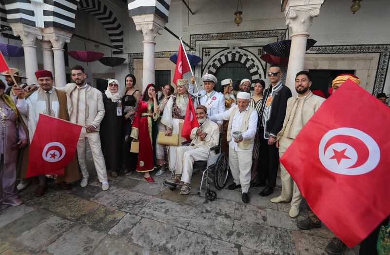 Tunisians celebrate their cultural roots and traditional costume and handicrafts.