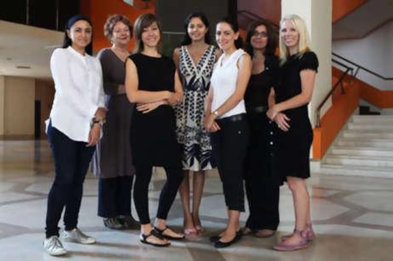 Members of the Abu Dhabi-based art collective Fanaan. From left, Daksha Bulsara, Emily Gordan, Julia Ibbini, Neena Rai, Linda Stephanian, Chritch and Jennifer Simon.