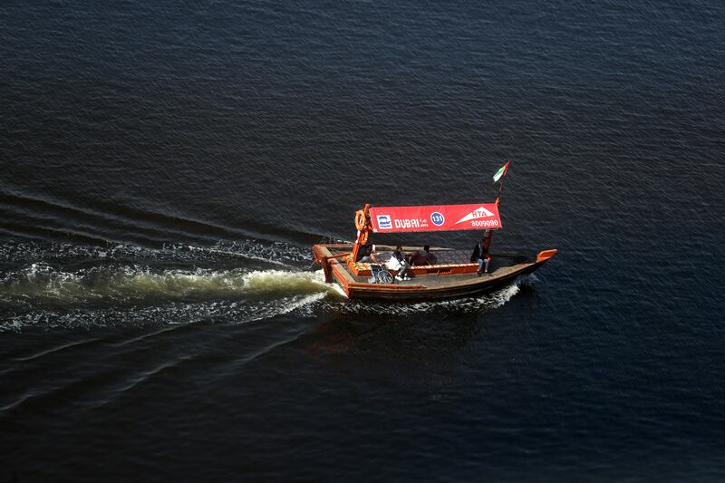 Boats take passengers to Deira, Dubai. Chris Whiteoak / The National