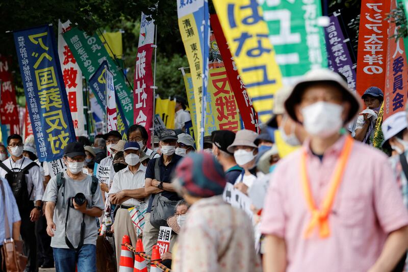 Protesters attend a rally outside Japan's parliament building as they demonstrate against the funeral. Opponents of the state-sponsored funeral, which has its roots in pre-war imperial ceremonies, say taxpayers’ money should be spent on more meaningful causes, such as addressing widening economic disparities caused by Abe’s policies. Reuters