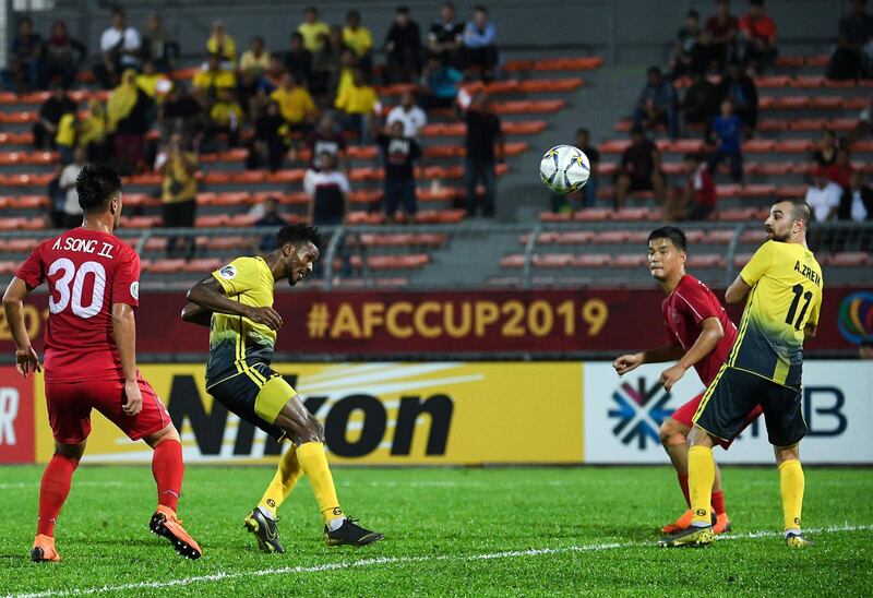 Al Ahed's midfielder Issah Yakubu scores the wining goal in the AFC Cup Final. AFP