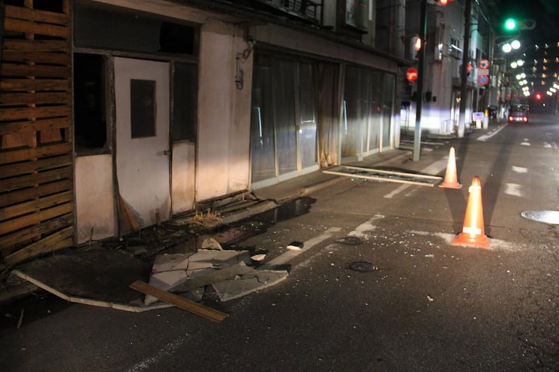 Damaged buildings are seen in Fukushima on February 13, 2021 after a strong 7.1-magnitude earthquake struck late off the eastern coast of Japan. AFP