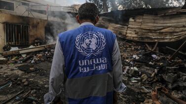 An UNRWA employee inspects a destroyed United Nations school following an air strike in Al Nuseirat refugee camp, central Gaza Strip. EPA