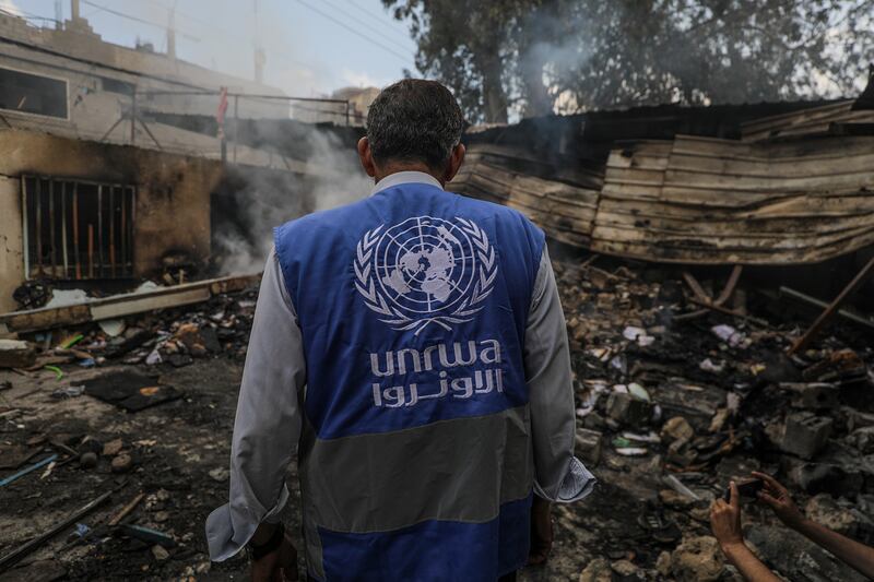 An UNRWA employee inspects a destroyed UN school following an air strike in Al Nuseirat refugee camp, central Gaza Strip, on May 14, 2024. EPA
