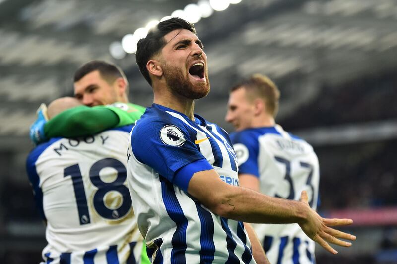 Brighton's Iranian midfielder Alireza Jahanbakhsh celebrates after Brighton's Dutch midfielder Aaron Mooy scores his team's second goal during the English Premier League football match between Brighton and Bournemouth at the American Express Community Stadium in Brighton, southern England on December 28, 2019. RESTRICTED TO EDITORIAL USE. No use with unauthorized audio, video, data, fixture lists, club/league logos or 'live' services. Online in-match use limited to 120 images. An additional 40 images may be used in extra time. No video emulation. Social media in-match use limited to 120 images. An additional 40 images may be used in extra time. No use in betting publications, games or single club/league/player publications.
 / AFP / Glyn KIRK                   / RESTRICTED TO EDITORIAL USE. No use with unauthorized audio, video, data, fixture lists, club/league logos or 'live' services. Online in-match use limited to 120 images. An additional 40 images may be used in extra time. No video emulation. Social media in-match use limited to 120 images. An additional 40 images may be used in extra time. No use in betting publications, games or single club/league/player publications.
