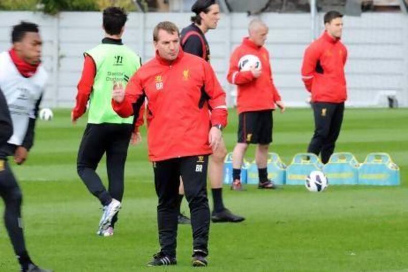 Brendan Rodgers, Liverpool's coach, takes a training session.