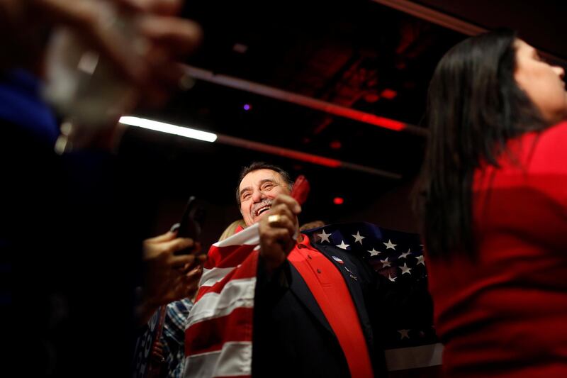 Supporter Ashur Warda cheers as midterm elections results come in at the GOP watch party in Arizona. Reuters