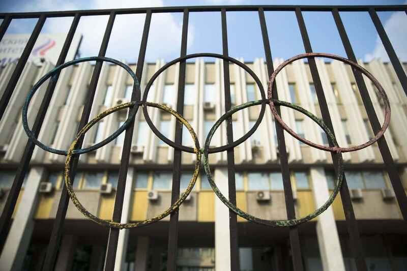 The Olympics rings are seen on a fence in front of the Russian Olympic Committee building in Moscow, Russia, Sunday, July 24, 2016. The IOC has decided against a complete ban on Russian athletes from the Olympics in Rio de Janeiro. Pavel Golovkin / AP Photo 