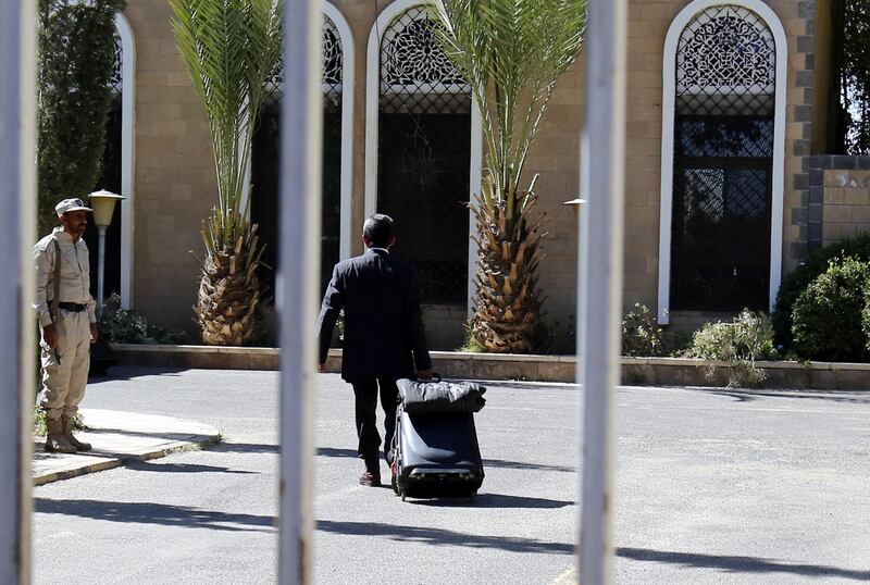 A member of a Houthi delegation prepares to fly on a Kuwait-chartered plane accompanied by UN special envoy for Yemen Martin Griffiths and Kuwaiti ambassador to Yemen Fahd Almeie to UN-sponsored peace talks in Sweden, in Sanaa. EPA