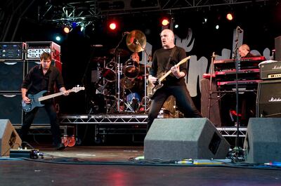 STOKE POGES, UNITED KINGDOM - JULY 10:  Jean-Jacques Burnel, Jet Black, Baz Warne and Dave Greenfield of The Stranglers perform on stage on the first day of Guilfest '09 at Stoke Park on July 10, 2009 in Stoke Poges, England. (Photo by Ollie Millington/Redferns/Getty Images) *** Local Caption ***  al17ma-music-stranglers.jpg