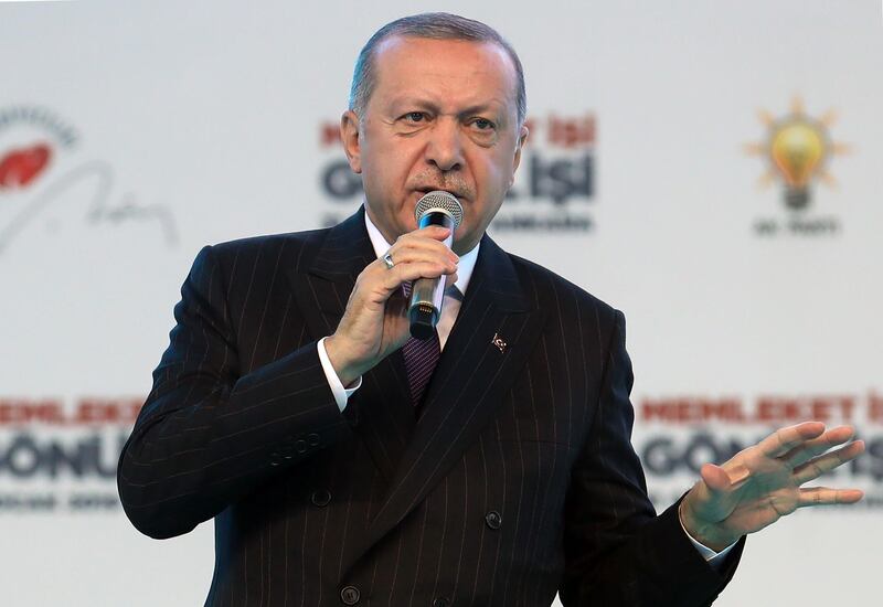 Turkish President and ruling Justice and Development (AK) Party chair Recep Tayyip Erdogan addresses an AK party presentation of mayoral candidates for upcoming local elections, at the Ankara Sports Hall in Ankara on January 31, 2019.  / AFP / Adem ALTAN
