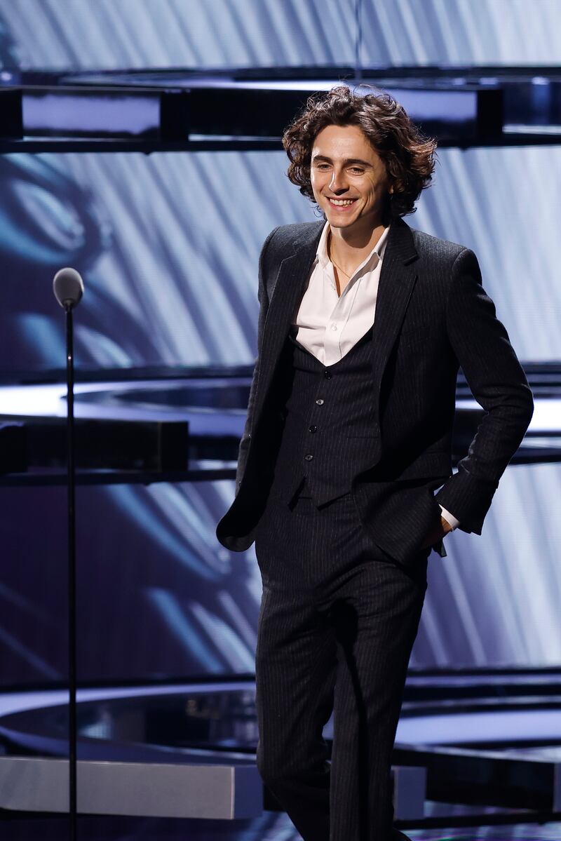 Actor Timothee Chalamet presents the Game of the Year award. EPA