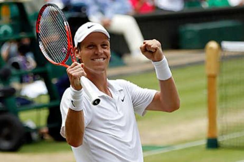 Tomas Berdych, the Czech, celebrates match point in his victory over Novak Djokovic, the world No 2.