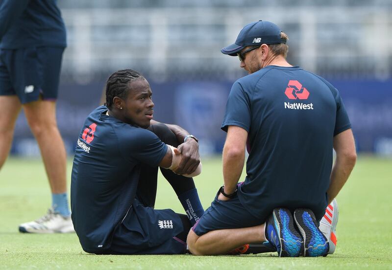 Jofra Archer chats with England physio Craig de Weyman in South Africa on January 24. Getty