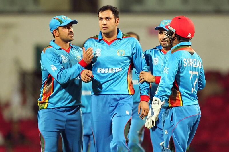 Mohammad Nabi, centre, will be part of the Afghanistan team to face the MCC at Lord's. AFP